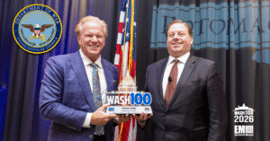 Garrettson & Duffey. EM CEO Jim Garrettson presented the 2026 Wash100 Award to USD(A&S) Michael Duffey.