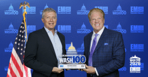 Mike Loomis and Jim Garrettson. EM CEO Jim Garrettson presented the 2026 Wash100 Award to Nokia Federal Solutions CEO Mike Loomis.