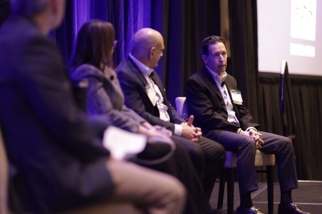 Tom Vecchiolla and fellow GovCon CEOs. The esteemed panel spoke at Potomac Officers Club's 2026 GovCon Executive Leadership Summit in February.