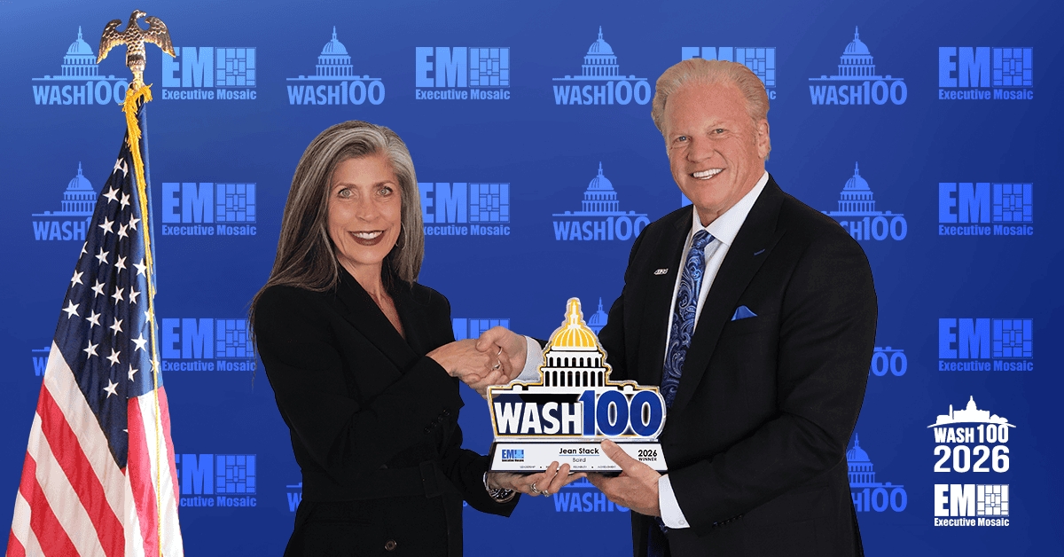 Jean Stack and Jim Garrettson. The Baird managing director shook hands with Executive Mosaic CEO Garrettson as she accepted the 2026 Wash100 Award