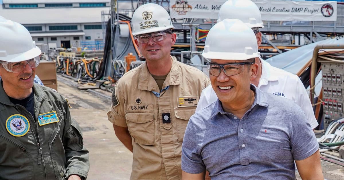 Hung Cao, acting Navy secretary (right), takes a tour of the Pearl Harbor Naval Shipyard on July 19, 2026. Photo: USN. Hung Cao. The acting Navy secretary (right) takes a tour of the Pearl Harbor Naval Shipyard on July 19, 2026.