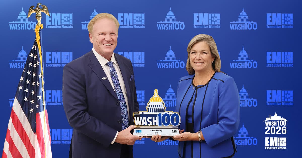 Jim Garrettson, CEO of Executive Mosaic, presented the 2026 Wash100 Award to DeEtte Gray, president of U.S. operations at CACI. Grey also won this year's Wash100 popular vote competition. Photo: EM Jim Garrettson and DeEtte Gray. Garrettson presented the 2026 Wash100 Award to Gray